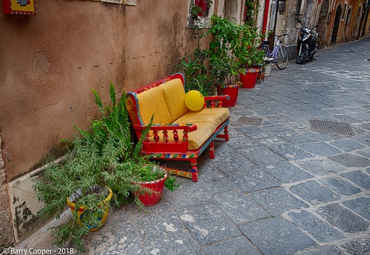 Colourful sofa and pots, Ortygia, Sicily